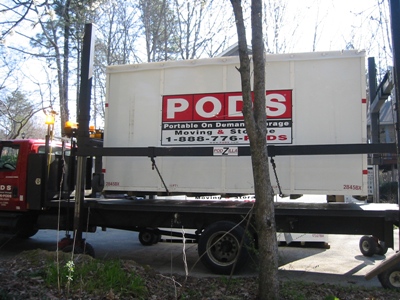 The first POD being picked up by its truck for delivery to a storage location